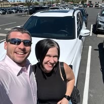Charles with happy customer couple