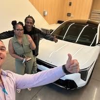 Charles and clients with new vehicle