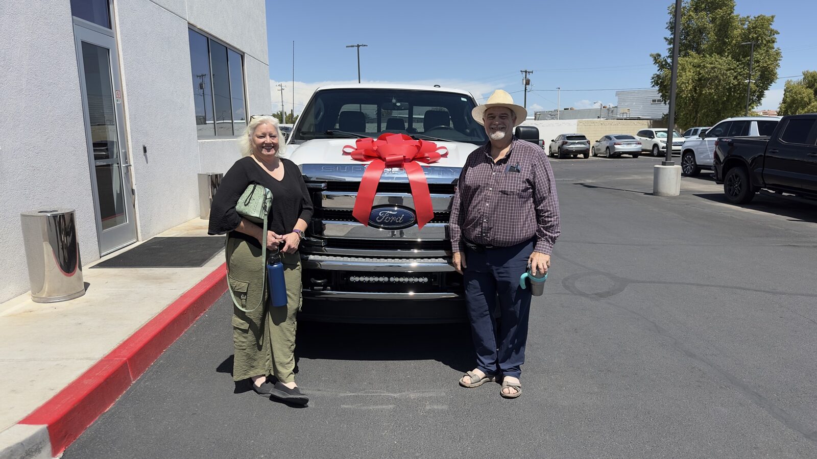 Happy couple with their new Super Duty on delivery day