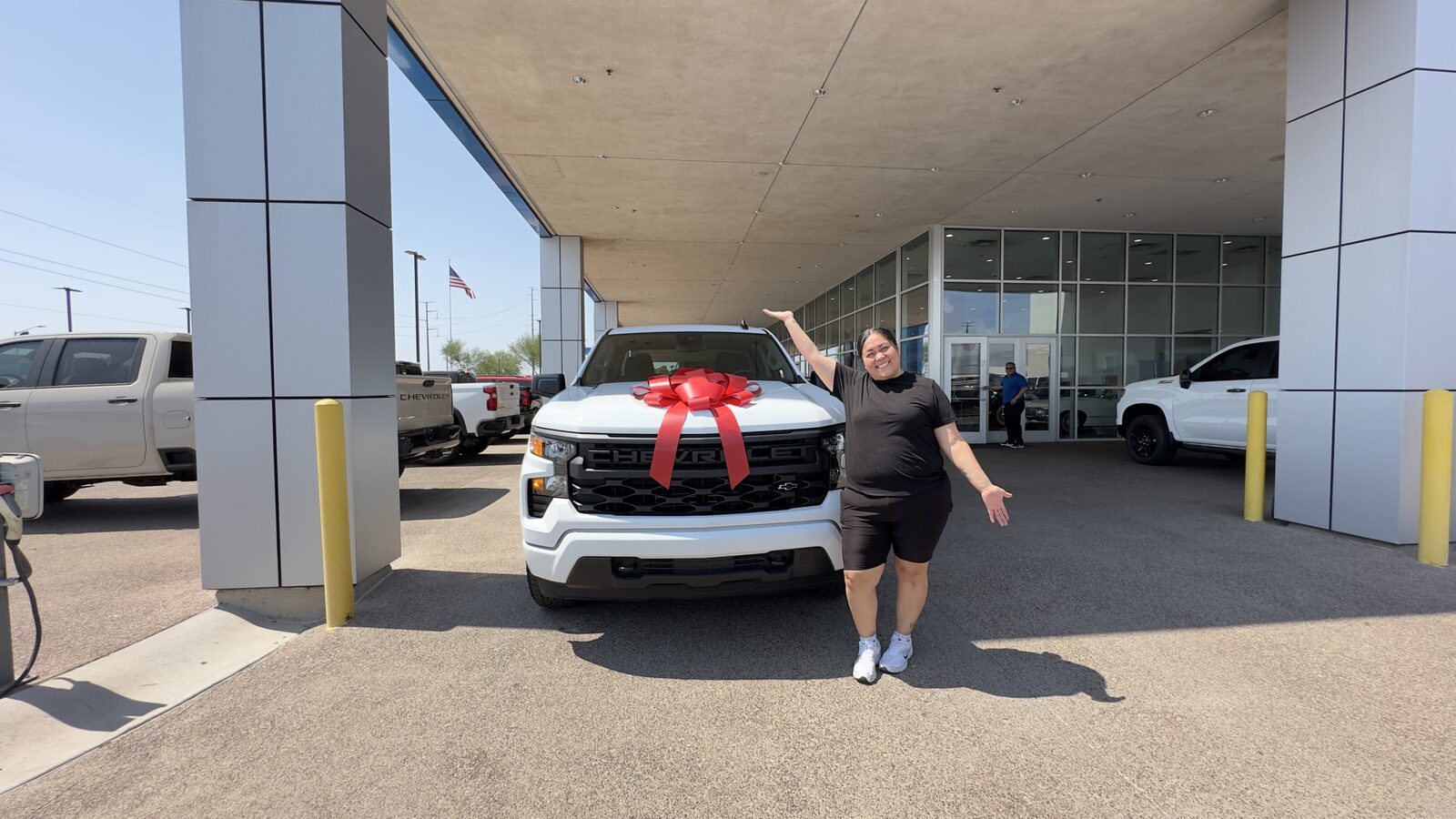 Proud new Silverado owner showing off her truck